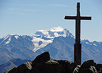 Summit cross with Grand Combin