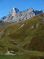 The farm of La Peule, crowned by the Grandes-Jorasses